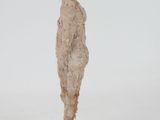 statue of a man standing on a wooden base with a white background