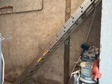 an image of a room with a ladder and a bucket