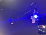 a blue light that is on the wall of a room