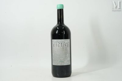 a bottle of wine that is sitting on a table