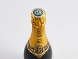 a bottle of champagne that is sitting on a table