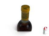 a bottle of wine that is sitting on a table