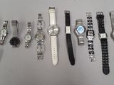 many different types of watches on the table