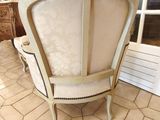 a chair that is sitting on the floor in the room