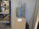 a box with a bunch of metal rods in it