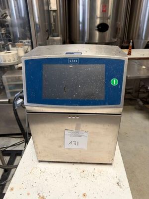 l'image d'une machine posée sur un comptoir