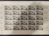 a sheet of stamps with a picture of a train on it