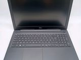 the dell laptop is open and ready to be used