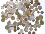 a lot of coins that are on the table