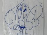 drawing of a cartoon character on a piece of paper with writing on it