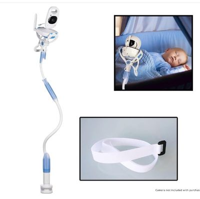 a picture of a baby in a crib with a camera attached to it