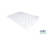 a close up of a mattress on a white background