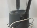 a blender that is sitting on a white table