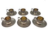 un service de six tasses et soucoupes plaquées argent