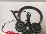 a pair of headphones sitting on top of a table