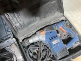 an open tool box with tools in it on the floor