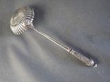 a spoon that is sitting on top of a table