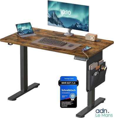 an image of a computer desk with a monitor and keyboard