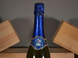 a bottle of wine that is sitting on a table