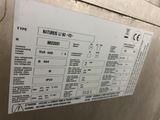 a picture of a sign on the side of a refrigerator