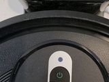 a close up view of a robotic vacuum cleaner