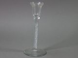 a glass vase that is sitting on a table