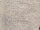 a close up of a person wearing a sweater and tie