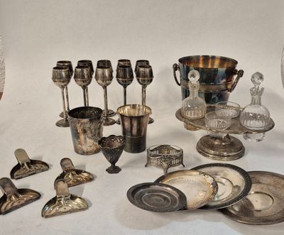 a lot of silver items that are on the table