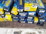 many boxes of blue and yellow items on the ground