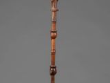 an image of a wooden pole with a bird on it