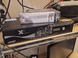 a rack with a bunch of electronic equipment on top of it