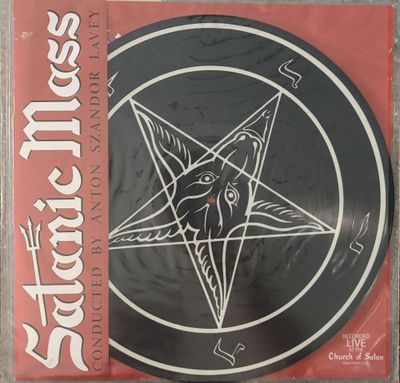 a cd with a pentagramt on the front of it