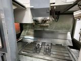 a machine that is working on a piece of metal