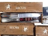 a lot of different types of kitchen utensils in a box