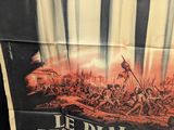 an old movie poster of a man holding a sword in front of a group of soldiers