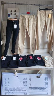 a woman standing on a shelf in a clothing store