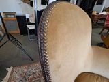 a chair that is sitting in the middle of a room
