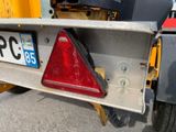 a close up of a license plate on the back of a truck