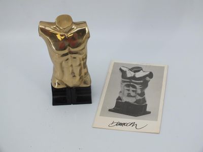 an old photo of a gold statue next to a picture of a man ' s torso