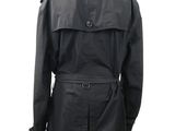 a black trench coat on a mannequin mannequin mannequin mannequin mannequin mannequin mannequin mannequin manne