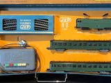a box with a train set in it on a table