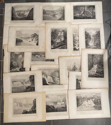 a lot of pictures that are laying on the floor