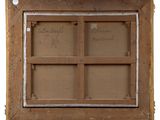 an old wooden window frame with writing on the inside of it