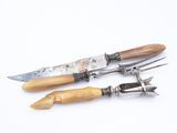 two different types of garden tools on a white surface