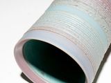 a close up of a pipe on a white surface
