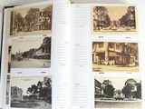 a book with pictures of old buildings on the pages