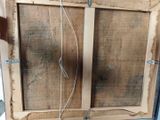 two pieces of wood that have been cut in half to make a window