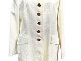 an image of a white jacket with gold buttons on a mannequin