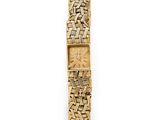 an 18k yellow gold ladies ' s wrist watch