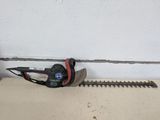 an image of a corded hedger on the ground